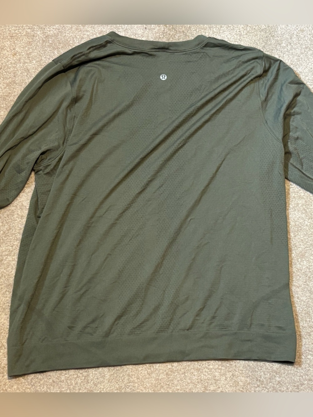 Womenโs lululemon size 12 olive green long sleeve